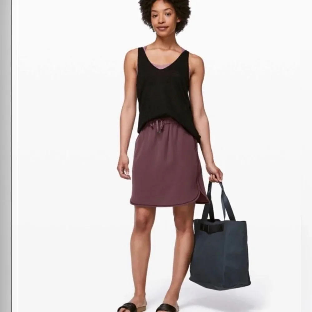 Lululemon on the fly skirt, color: cherry cola, size 4